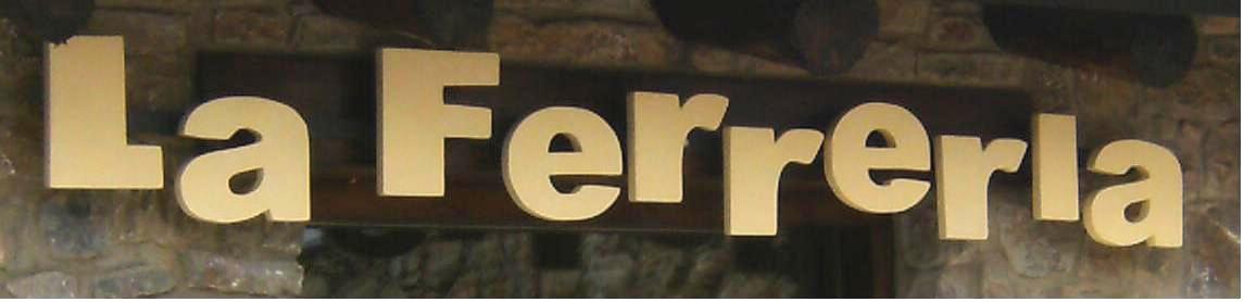 Rètol de fusta de l'espai museístic La Ferreria de Pi (2010)
